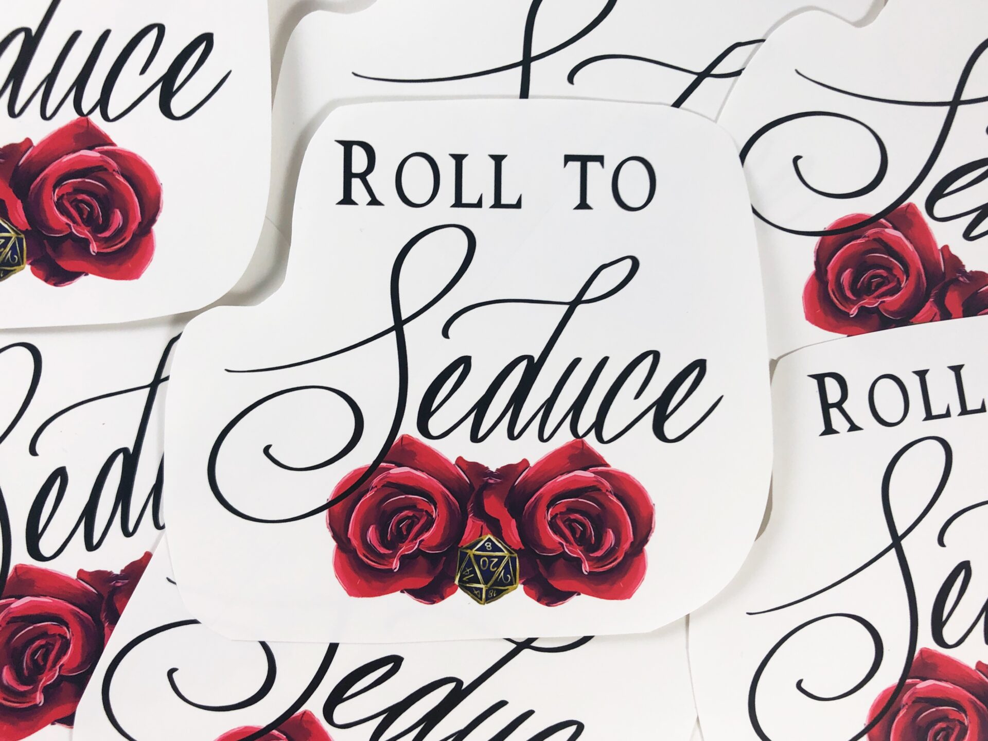 Roll to Seduce. Painting of roses with a twenty sided die.